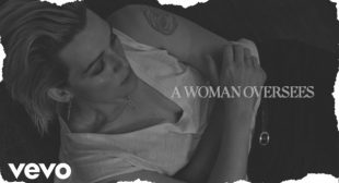 A Woman Oversees Lyrics